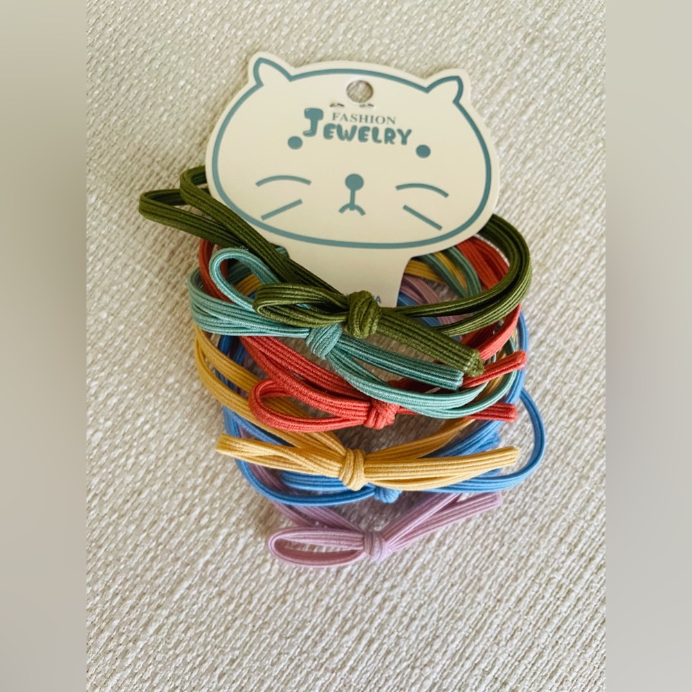 New Hair Ties or Bracelets. Bright multicolored. 6 total pieces.